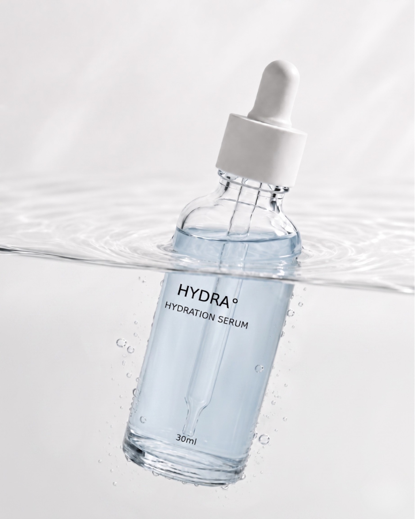 HYDRA — serum bottle in water