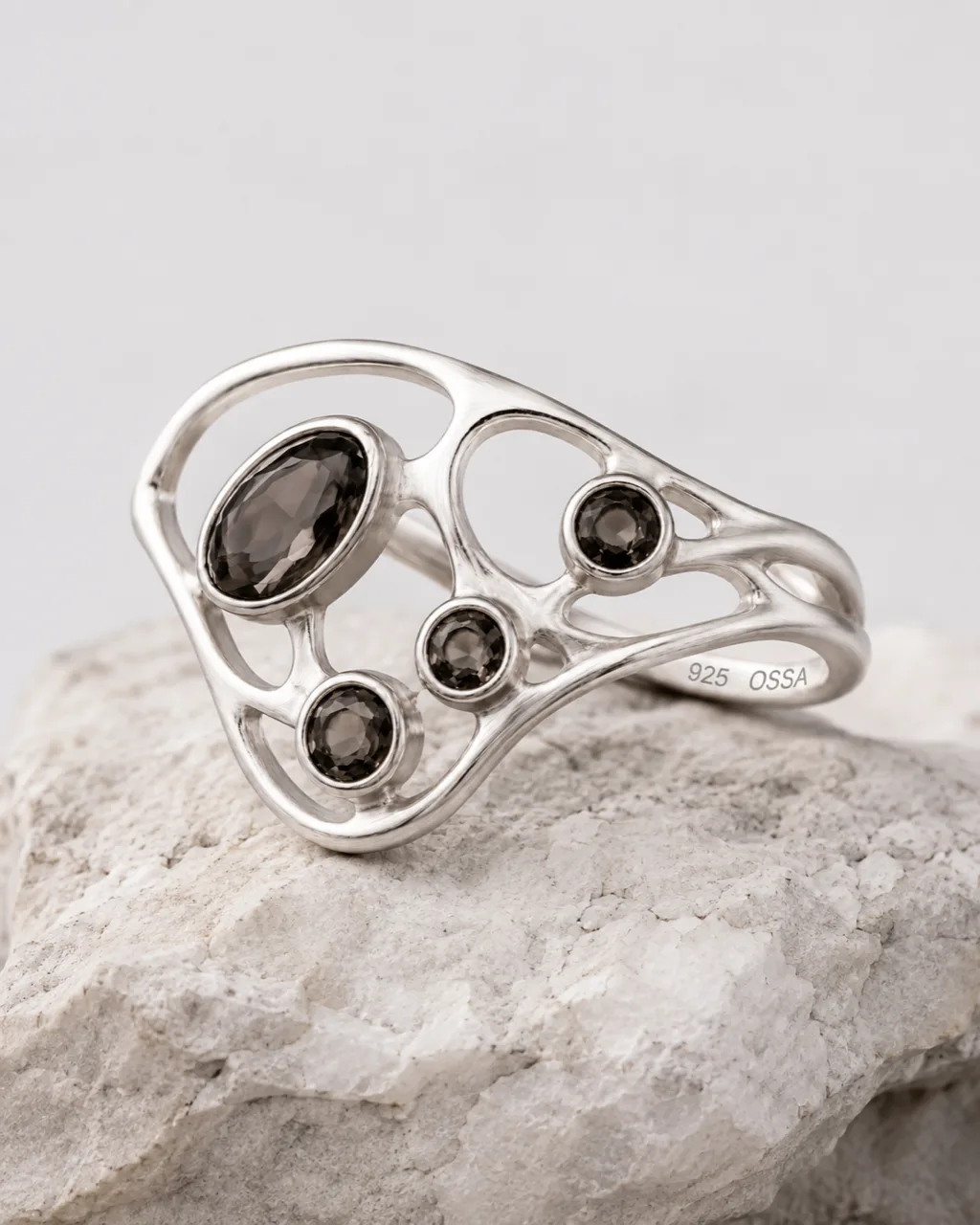 The OSSA ring on pale stone