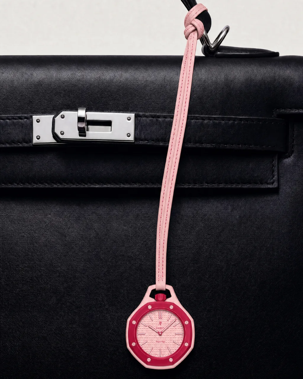 Royal POP - pink watch charm on handbag