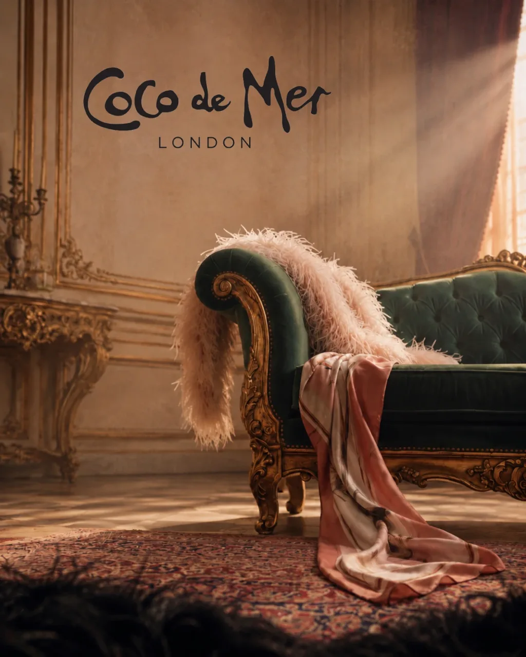 Coco de Mer key visual: a green velvet chaise with a feather boa and silk in a gilded salon, with the Coco de Mer London logo. Self-initiated concept editorial, not a client.