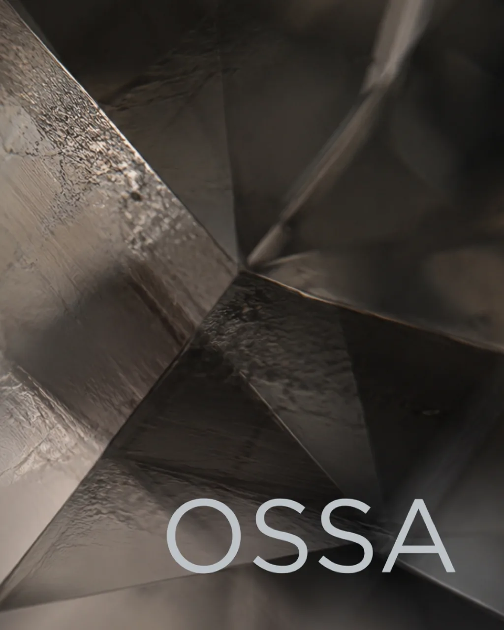 OSSA key visual: the facets of a smoky quartz stone in extreme close-up, with the OSSA name, AI concept work