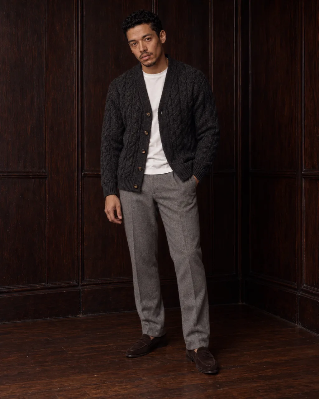 Sunderly look 6, charcoal cable cardigan and grey flannel trousers: full length from the front, AI concept work