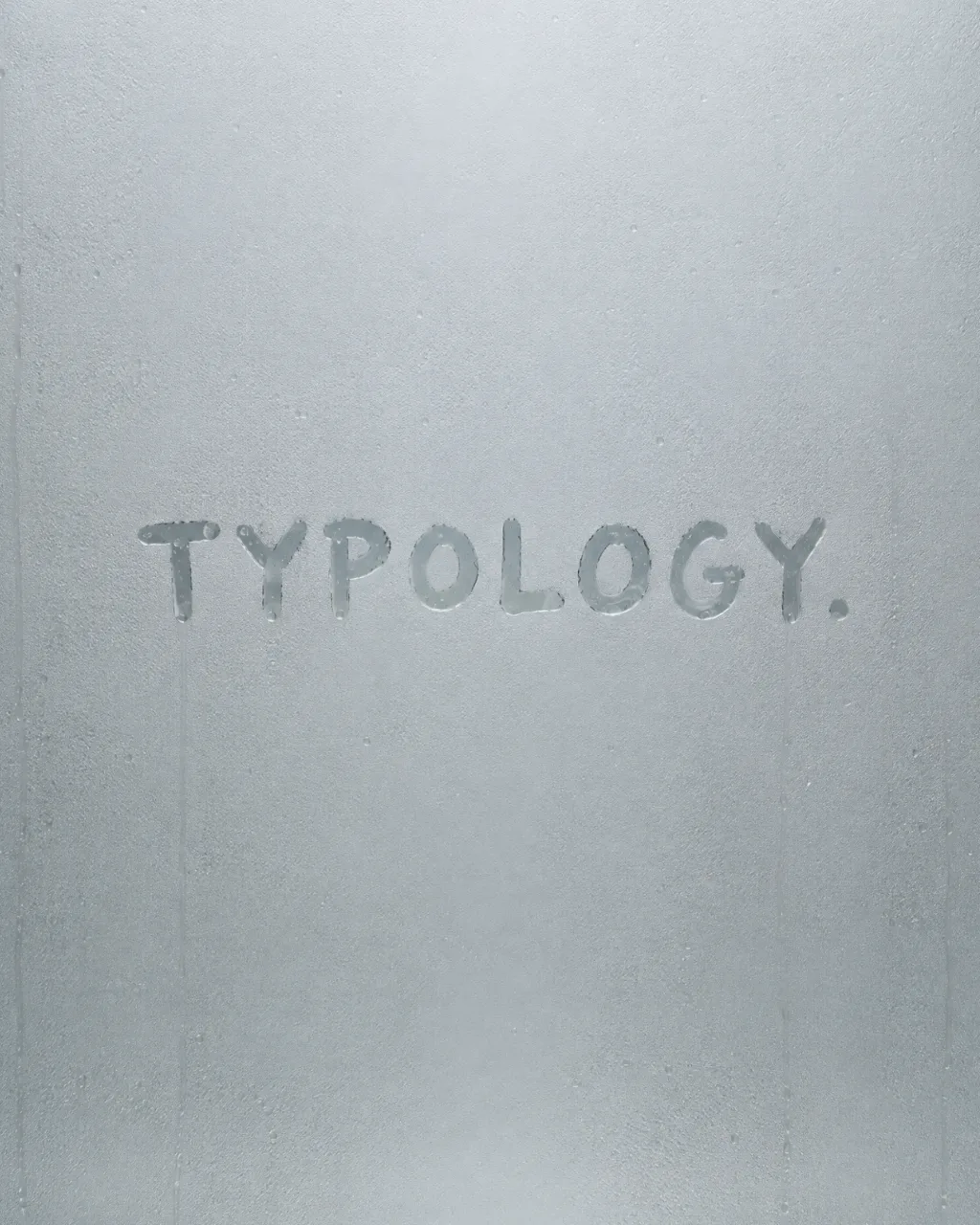 The Typology wordmark written by hand in a steamed bathroom mirror, AI concept work